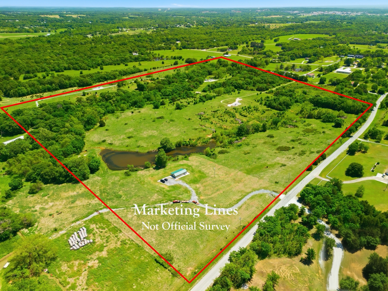 Aerial acreage property marketing image with boundary lines